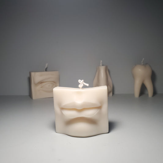 Facial feature candle