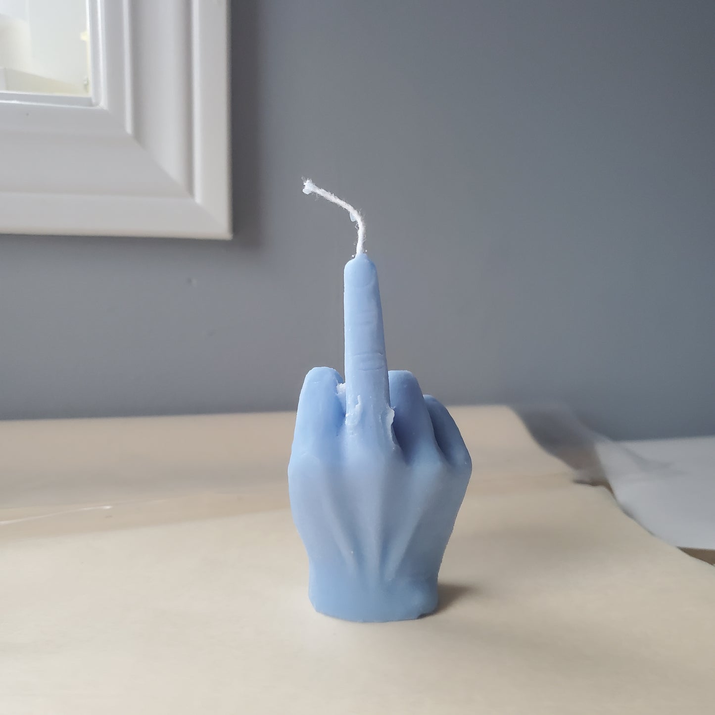 Middle finger candle