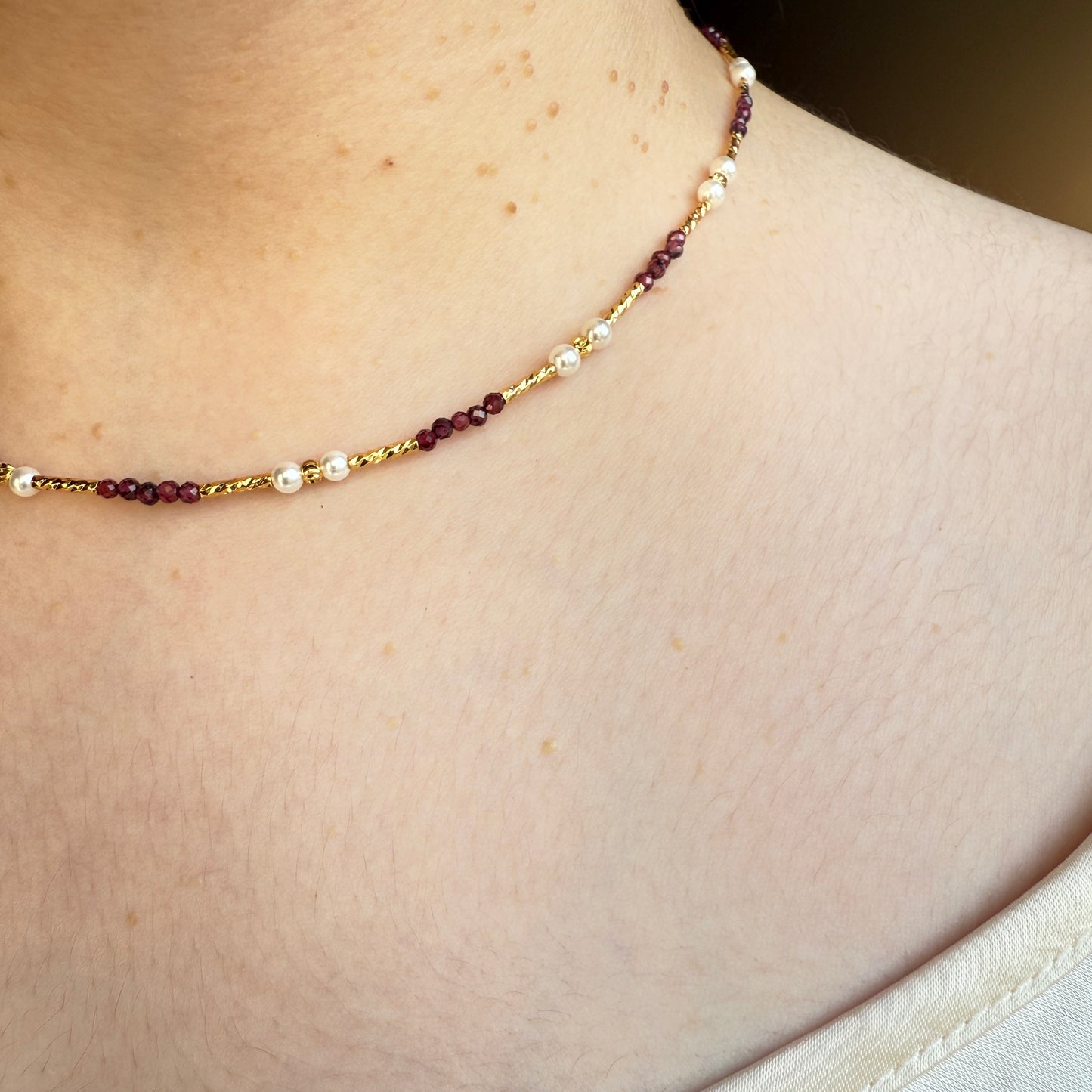 Gold accent garnet necklace