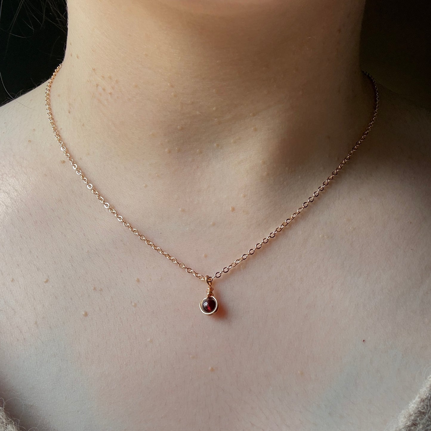 Gold accent garnet necklace
