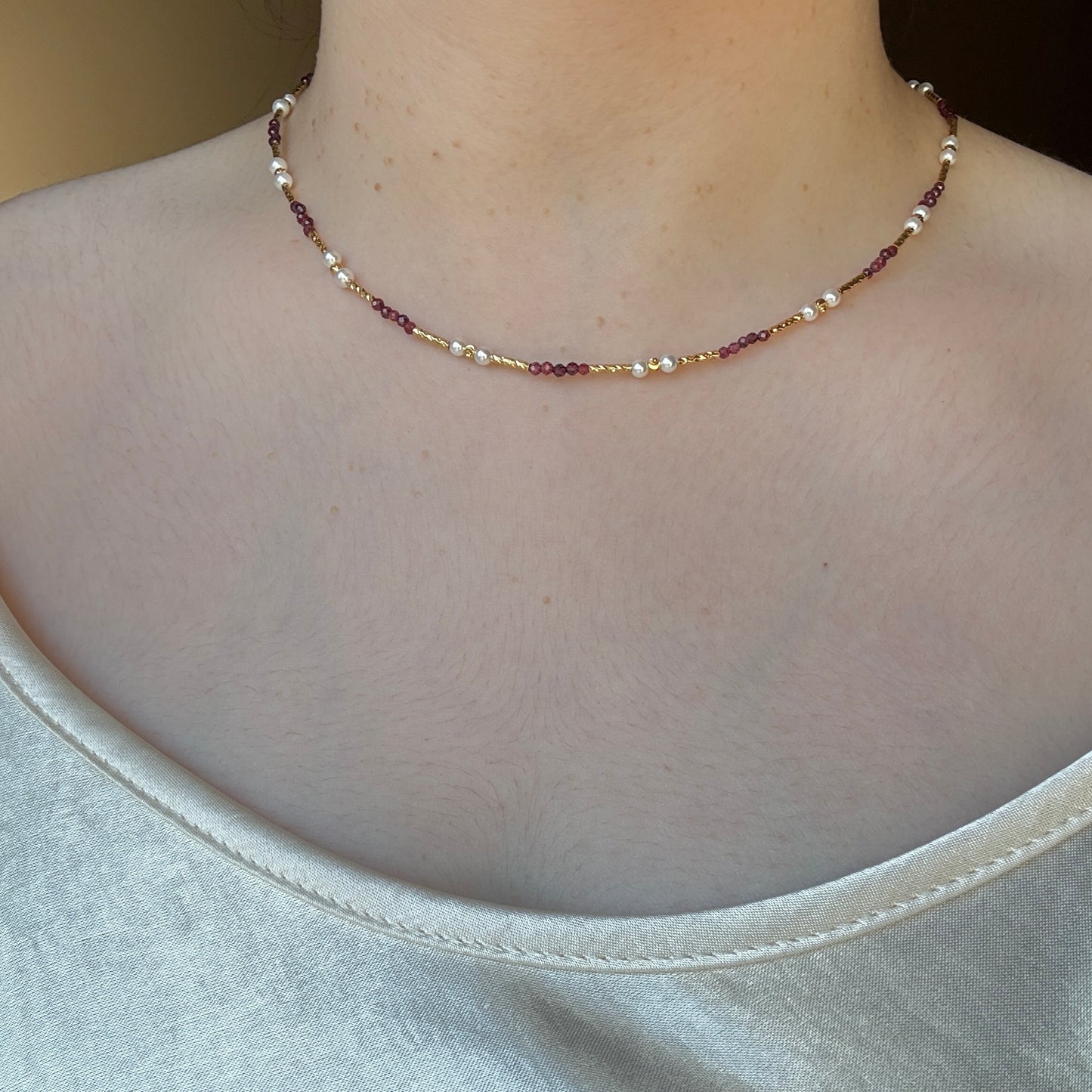 Gold accent garnet necklace