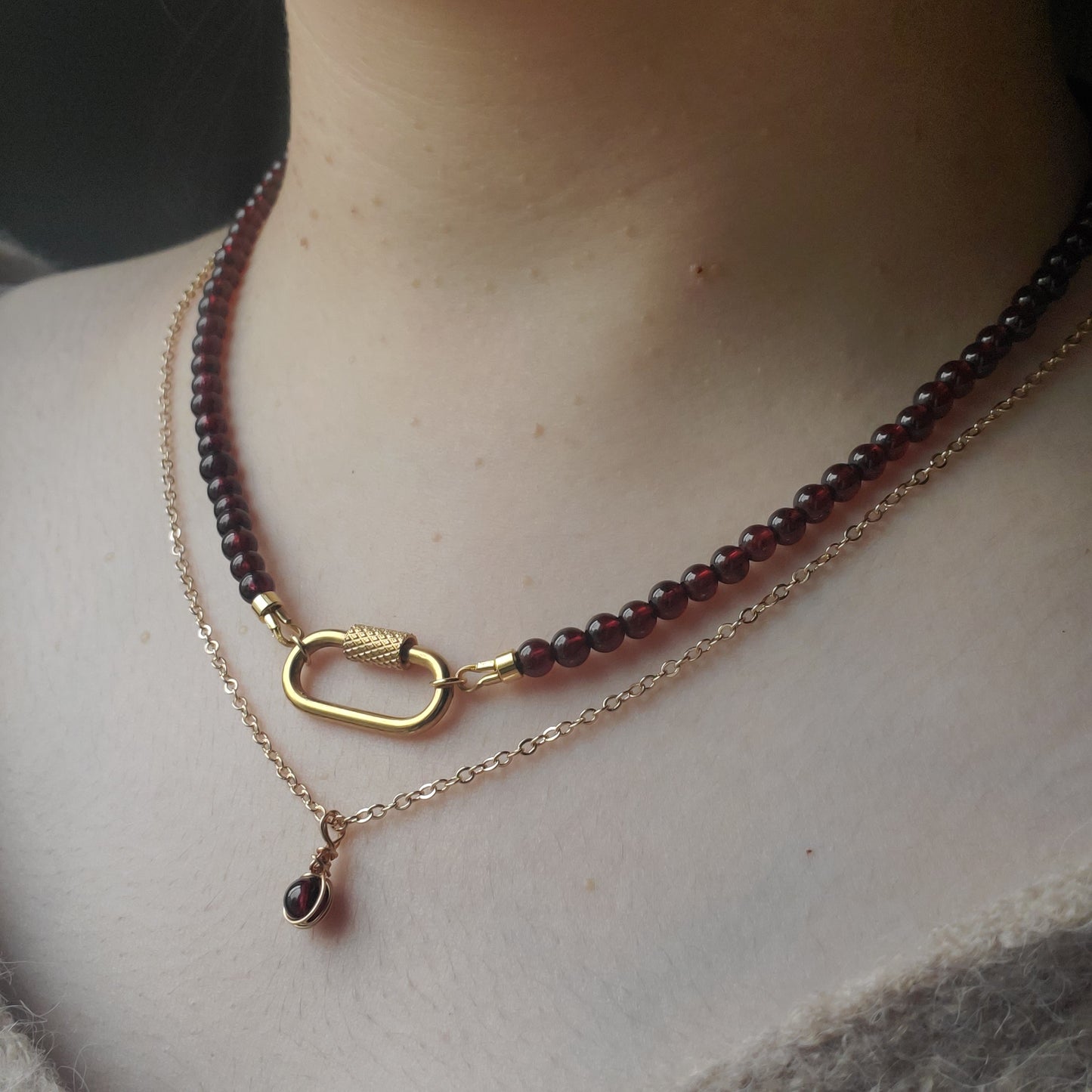 Gold accent garnet necklace