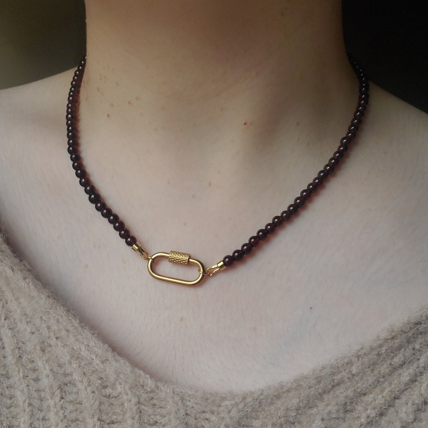 Gold accent garnet necklace