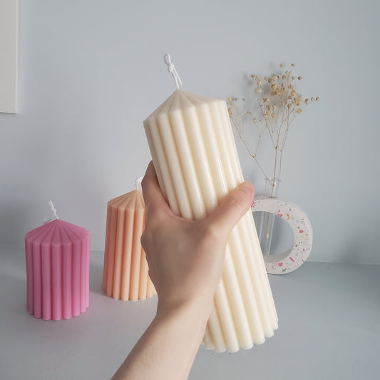 Large peaked ribbed candle