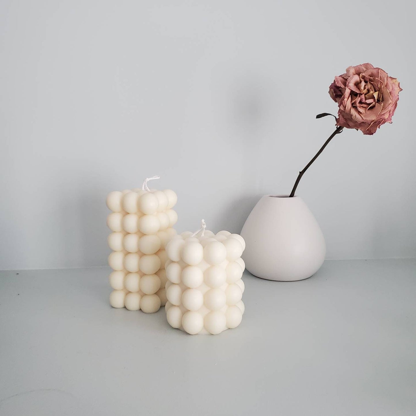 Spherical bubble cube candle